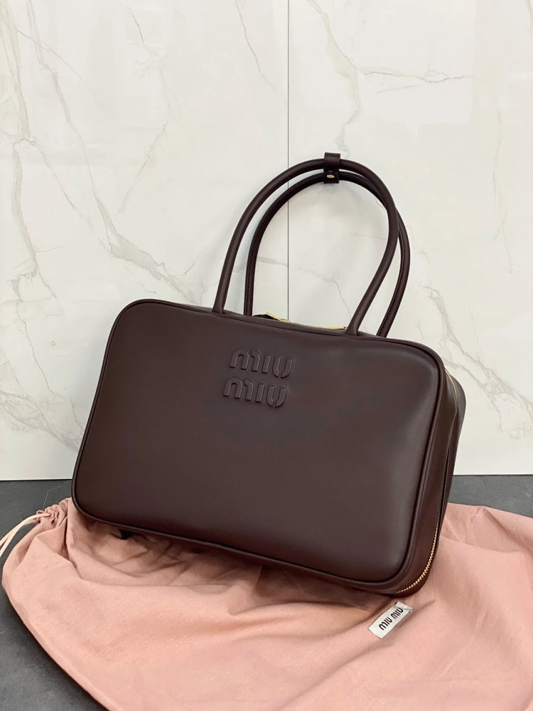 miumiu Original Leather Handheld Official Document Bag for Women 2025 New Large Capacity Retro Under