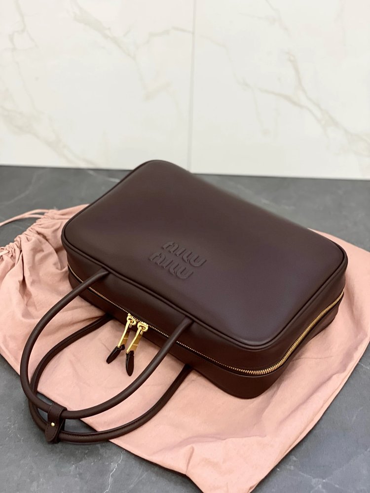 miumiu Original Leather Handheld Official Document Bag for Women 2025 New Large Capacity Retro Under